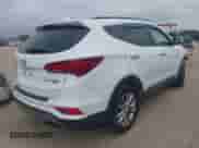 2017 Hyundai Santa Fe 2.0T with VIN 5NMZUDLA8HH045920, listed as a IAAI auction lot 42698147 with 68,609 mi miles and . Bid and sale history available at DreamBid. Image 4.