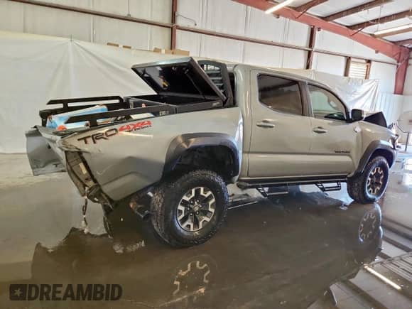 2021 Toyota Tacoma SR with VIN 5TFCZ5AN2MX251688, listed as a Copart auction lot 80790625 with 129,693 mi miles and Salvage title. Bid and sale history available at DreamBid. Image 3.