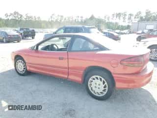 1995 Saturn SC with VIN 1G8ZE1285SZ141155, listed as a Copart auction lot 65757374 with 150,973 mi miles and Salvage title. Bid and sale history available at DreamBid. Image 2.