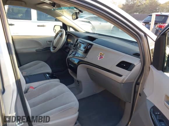 2014 Toyota Sienna LE AAS with VIN 5TDKK3DC0ES457615, listed as a IAAI auction lot 43502655 with 146,897 mi miles and . Bid and sale history available at DreamBid. Image 5.