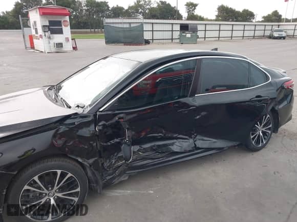 2019 Toyota Camry LE с VIN 4T1B11HK2KU833243, выставлен на аукционе IAAI как лот 42855313 с пробегом 128 404 миль миль и . История ставок и продаж доступна на DreamBid. Изображение 6.