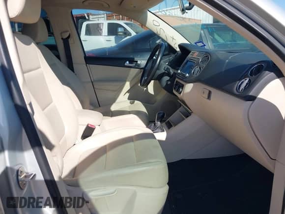 2011 Volkswagen Tiguan S with VIN WVGAV7AX1BW555710, listed as a IAAI auction lot 43025250 with 174,370 mi miles and . Bid and sale history available at DreamBid. Image 5.