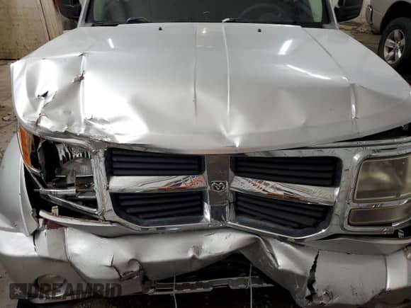 2009 Dodge Nitro SE z VIN 1D8GT28K69W527432, wystawiony jako Copart lot #72401114 z przebiegiem 108 070 mil mil oraz Szkoda całkowita • Salvage title. Historia ofert i sprzedaży dostępna na DreamBid. Obrazek 12.