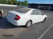 2004 Toyota Camry LE with VIN 4T1BE32K14U324837, listed as a IAAI auction lot 43132115 with 180,230 mi miles and . Bid and sale history available at DreamBid. Image 4.