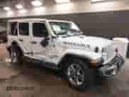 2022 Jeep Wrangler Unlimited Sahara with VIN 1C4HJXEG1NW259602, listed as a IAAI auction lot 41429526 with 31,762 mi miles and . Bid and sale history available at DreamBid. Image 1.