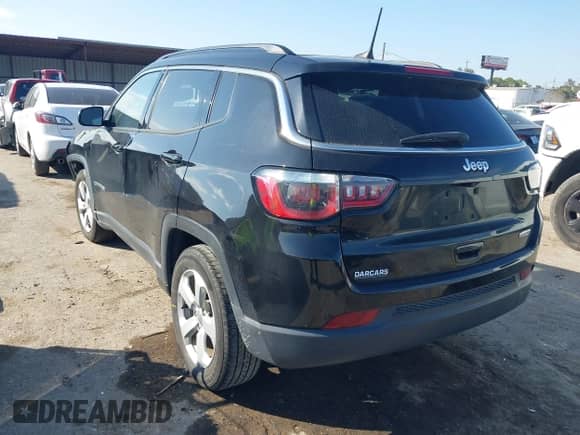 2020 Jeep Compass Latitude with VIN 3C4NJCBB7LT133977, listed as a IAAI auction lot 40950290 with 71,428 mi miles and . Bid and sale history available at DreamBid. Image 3.