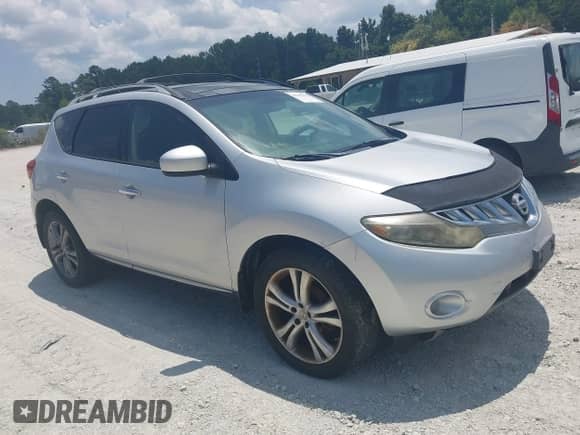 2009 Nissan Murano SL with VIN JN8AZ18W79W117923, listed as a IAAI auction lot 42787612 with 206,297 mi miles and . Bid and sale history available at DreamBid. Image 1.