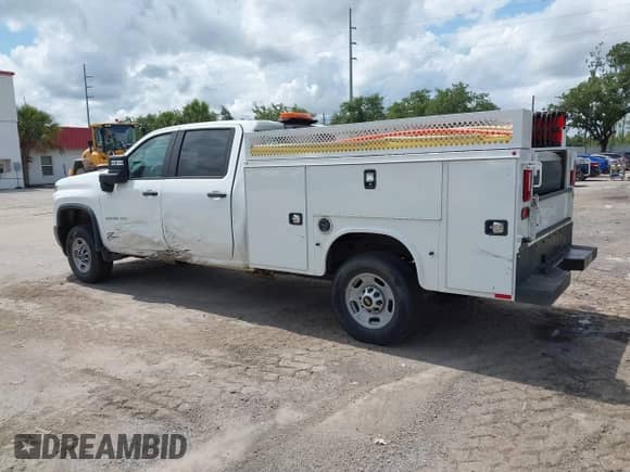 2023 Chevrolet Silverado 2500HD Work Truck z VIN 1GB1YLE71PF146990, wystawiony jako IAAI lot #42350795 z przebiegiem 60 144 mil mil oraz . Historia ofert i sprzedaży dostępna na DreamBid. Obrazek 3.