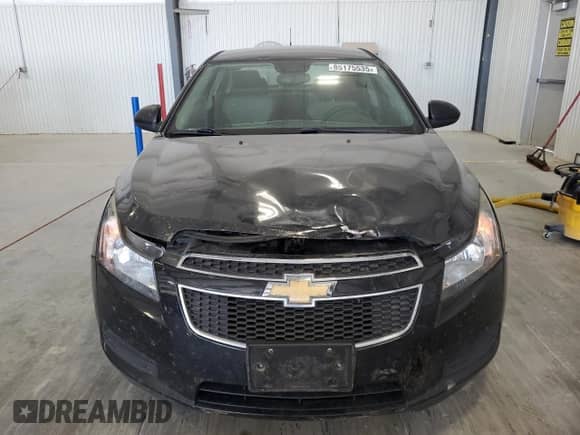 2014 Chevrolet Cruze LS z VIN 1G1PA5SH2E7457864, wystawiony jako Copart lot #85175535 z przebiegiem 140 535 mil mil oraz Szkoda całkowita • Salvage title. Historia ofert i sprzedaży dostępna na DreamBid. Obrazek 5.