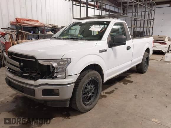 2019 Ford F-150 XL with VIN 1FTMF1C53KKE18847, listed as a IAAI auction lot 41526344 with 184,942 mi miles and . Bid and sale history available at DreamBid. Image 2.
