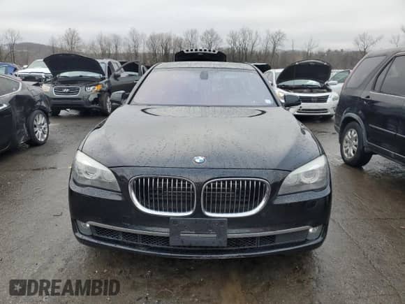 2011 BMW 7 Series с VIN WBAKX6C5XBC197126, выставлен на аукционе Copart как лот 84742634 с пробегом 72 551 миль миль и Чистый • Clean title. История ставок и продаж доступна на DreamBid. Изображение 5.