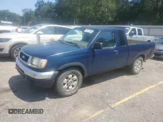 1998 Nissan Frontier XE with VIN 1N6DD26S3WC357574, listed as a Copart auction lot 70407005 with 198,490 mi miles and Clean title. Bid and sale history available at DreamBid. Image 1.