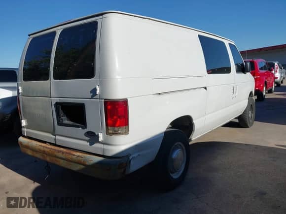 2004 Ford Econoline Cargo with VIN 1FTNE24L34HA18183, listed as a IAAI auction lot 43507164 with 193,488 mi miles and . Bid and sale history available at DreamBid. Image 4.