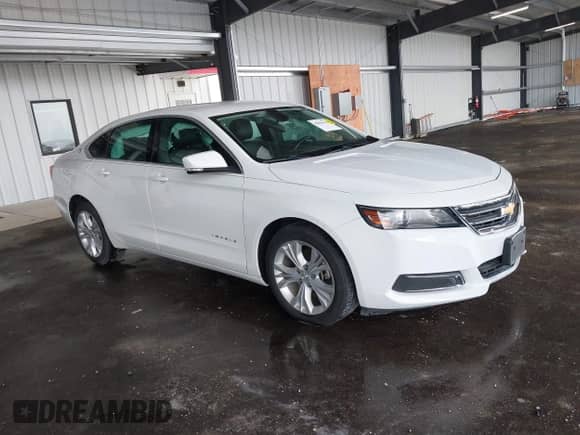 2015 Chevrolet Impala LT z VIN 1G1125S35FU139604, wystawiony jako IAAI lot #42096518 z przebiegiem 104 405 mil mil oraz . Historia ofert i sprzedaży dostępna na DreamBid. Obrazek 1.
