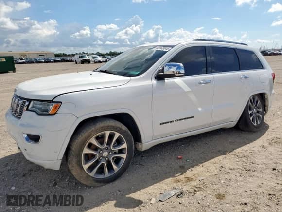 2017 Jeep Grand Cherokee Overland with VIN 1C4RJECG8HC965161, listed as a Copart auction lot 82068045 with 99,654 mi miles and Salvage title. Bid and sale history available at DreamBid. Image 1.