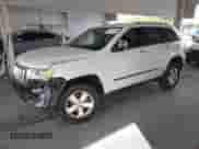 2013 Jeep Grand Cherokee Limited z VIN 1C4RJEBG6DC595730, wystawiony jako IAAI lot #43418036 z przebiegiem 163 431 mil mil oraz . Historia ofert i sprzedaży dostępna na DreamBid. Obrazek 19.
