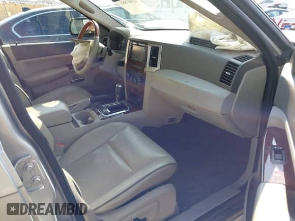 2009 Jeep Grand Cherokee with VIN 1J8HR68T29C532462, listed as a IAAI auction lot 42007581 with 136,379 mi miles and . Bid and sale history available at DreamBid. Image 5.