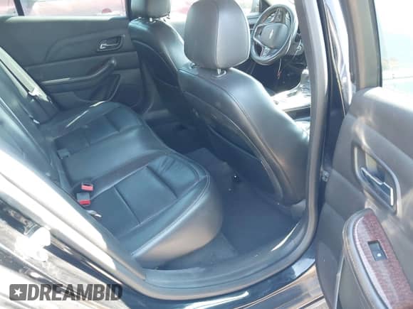 2013 Chevrolet Malibu LTZ z VIN 1G11H5SA7DU134429, wystawiony jako IAAI lot #43379919 z przebiegiem 137 597 mil mil oraz . Historia ofert i sprzedaży dostępna na DreamBid. Obrazek 8.