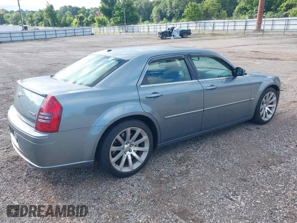 2006 Chrysler 300 C SRT-8 with VIN 2C3LA73W66H523504, listed as a IAAI auction lot 42483103 with 61,560 mi miles and . Bid and sale history available at DreamBid. Image 4.