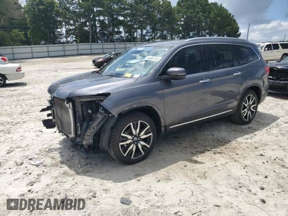 2022 Honda Pilot Touring 7-Passenger with VIN 5FNYF5H68NB029195, listed as a Copart auction lot 64963765 with 45,174 mi miles and Salvage title. Bid and sale history available at DreamBid. Image 1.