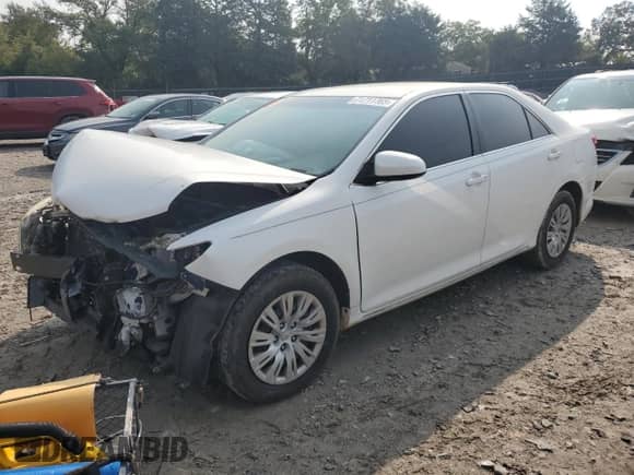 2012 Toyota Camry L z VIN 4T1BF1FK6CU518385, wystawiony jako Copart lot #71711765 z przebiegiem 272 274 mil mil oraz Czysty tytuł • Clean title. Historia ofert i sprzedaży dostępna na DreamBid. Obrazek 1.