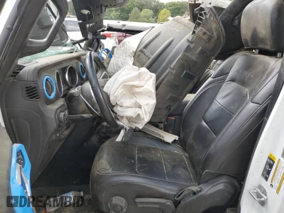 2021 Jeep Wrangler Unlimited Sahara with VIN 1C4JJXP64MW682744, listed as a Copart auction lot 69235075 with 65,533 mi miles and Salvage title. Bid and sale history available at DreamBid. Image 7.