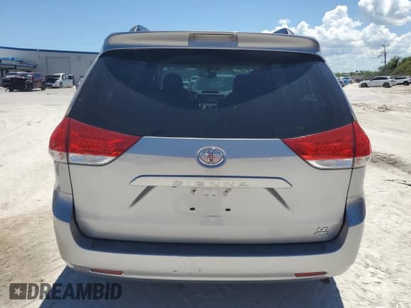 2012 Toyota Sienna LE with VIN 5TDJK3DC2CS043213, listed as a Copart auction lot 69035885 with 171,467 mi miles and Clean title. Bid and sale history available at DreamBid. Image 6.