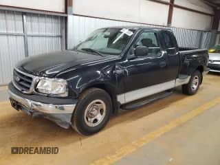 2003 Ford F-150 XL with VIN 1FTRX07203KD64387, listed as a Copart auction lot 60302655 with Not provided miles and Salvage title. Bid and sale history available at DreamBid. Image 1.