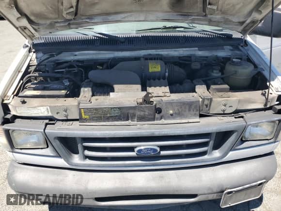 2003 Ford Econoline Cargo с VIN 1FTRE14293HA13605, выставлен на аукционе Copart как лот 64129745 с пробегом 256 829 миль миль и Списание • Salvage title. История ставок и продаж доступна на DreamBid. Изображение 12.