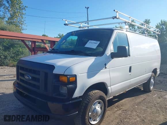 2011 Ford Econoline Cargo Commercial with VIN 1FTNE2EW9BDA26818, listed as a IAAI auction lot 43123909 with 176,560 mi miles and . Bid and sale history available at DreamBid. Image 2.