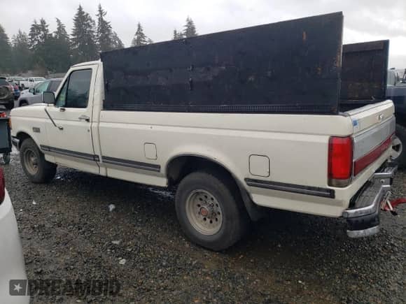 1991 Ford F-150 z VIN 1FTEF15N8MLA29118, wystawiony jako Copart lot #86580234 z przebiegiem 66 814 mil mil oraz Szkoda całkowita • Salvage title. Historia ofert i sprzedaży dostępna na DreamBid. Obrazek 2.