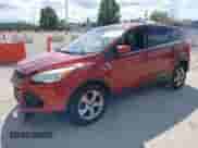 2014 Ford Escape SE with VIN 1FMCU0GX5EUC16474, listed as a IAAI auction lot 40276119 with 112,714 mi miles and . Bid and sale history available at DreamBid. Image 2.