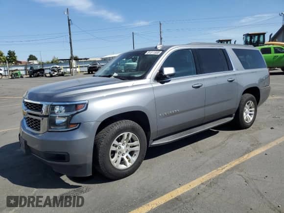 2018 Chevrolet Suburban LT z VIN 1GNSKHKC1JR363632, wystawiony jako Copart lot #81511555 z przebiegiem 102 225 mil mil oraz Szkoda całkowita • Salvage title. Historia ofert i sprzedaży dostępna na DreamBid. Obrazek 1.
