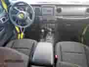 2023 Jeep Wrangler Sport S with VIN 1C4HJXDG9PW617307, listed as a Copart auction lot 57702455 with 45,620 mi miles and Salvage title. Bid and sale history available at DreamBid. Image 8.