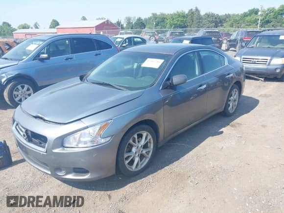 2014 Nissan Maxima SV z VIN 1N4AA5AP7EC906006, wystawiony jako IAAI lot #42411784 z przebiegiem 192 504 mil mil oraz . Historia ofert i sprzedaży dostępna na DreamBid. Obrazek 2.
