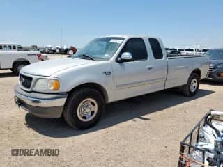 2002 Ford F-150 XL with VIN 1FTRX17L82NA73485, listed as a Copart auction lot 65565265 with 186,263 mi miles and Clean title. Bid and sale history available at DreamBid. Image 1.