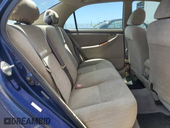 2004 Toyota Corolla CE z VIN 1NXBR32E04Z268677, wystawiony jako Copart lot #69282035 z przebiegiem 94 770 mil mil oraz Szkoda całkowita • Salvage title. Historia ofert i sprzedaży dostępna na DreamBid. Obrazek 10.