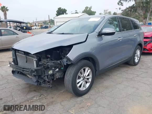 2020 Kia Sorento LX with VIN 5XYPG4A39LG669053, listed as a IAAI auction lot 42371689 with 58,952 mi miles and . Bid and sale history available at DreamBid. Image 2.