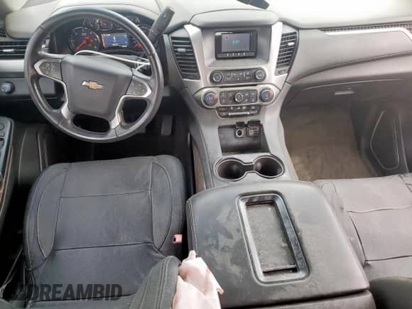 2015 Chevrolet Tahoe LS с VIN 1GNSCAKC8FR300541, выставлен на аукционе Copart как лот 82000065 с пробегом 120 103 миль миль и Списание • Salvage title. История ставок и продаж доступна на DreamBid. Изображение 8.