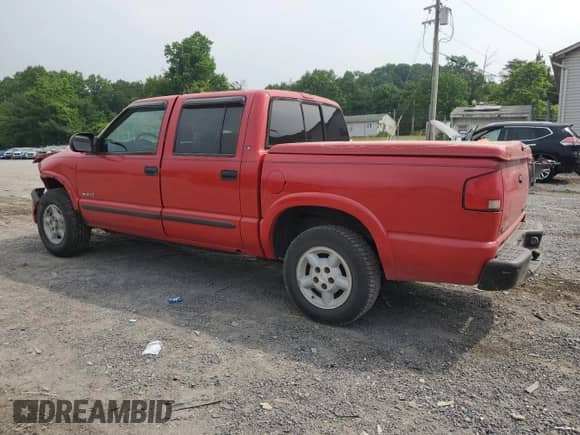 2001 Chevrolet S-10 LS with VIN 1GCDT13WX1K243481, listed as a Copart auction lot 59853135 with 212,015 mi miles and Salvage title. Bid and sale history available at DreamBid. Image 2.