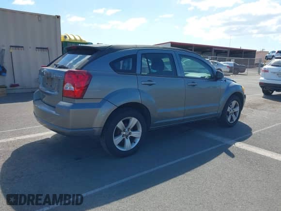 2011 Dodge Caliber Mainstreet with VIN 1B3CB3HA1BD295385, listed as a IAAI auction lot 43526036 with 149,158 mi miles and . Bid and sale history available at DreamBid. Image 4.