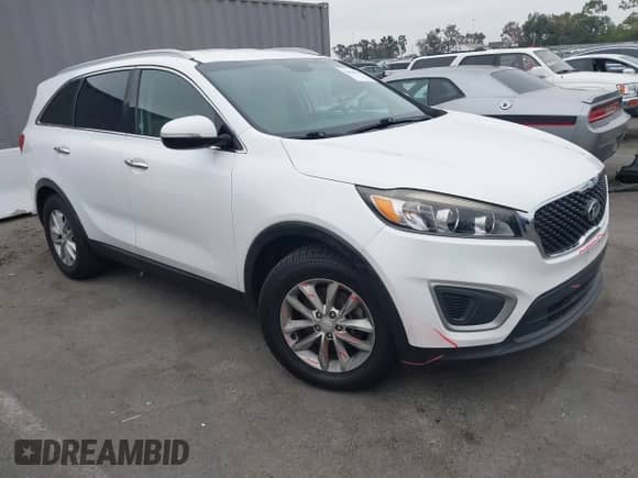 2018 Kia Sorento LX z VIN 5XYPG4A5XJG359038, wystawiony jako IAAI lot #42966967 z przebiegiem 75 087 mil mil oraz . Historia ofert i sprzedaży dostępna na DreamBid. Obrazek 1.