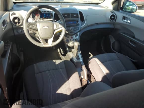 2014 Chevrolet Sonic LT с VIN 1G1JC6SG5E4122676, выставлен на аукционе Copart как лот 71094265 с пробегом 5 817 миль миль и Списание • Salvage title. История ставок и продаж доступна на DreamBid. Изображение 8.