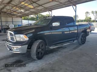 2009 Dodge 1500 SLT with VIN 1D3HV13T39S809534, listed as a Copart auction lot 65088125 with 87,957 mi miles and Salvage title. Bid and sale history available at DreamBid. Image 1.