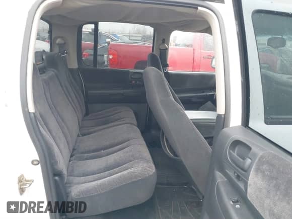 2002 Dodge Dakota SLT with VIN 1B7HL48N72S505915, listed as a IAAI auction lot 41451568 with 220,716 mi miles and . Bid and sale history available at DreamBid. Image 8.