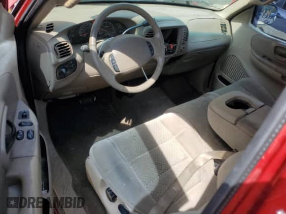 2002 Ford F-150 XL z VIN 1FTRX172X2NA15210, wystawiony jako Copart lot #69617895 z przebiegiem 139 196 mil mil oraz Szkoda całkowita • Salvage title. Historia ofert i sprzedaży dostępna na DreamBid. Obrazek 8.