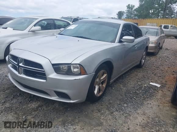 2012 Dodge Charger SE with VIN 2C3CDXBG0CH286523, listed as a IAAI auction lot 43331770 with 315,789 mi miles and . Bid and sale history available at DreamBid. Image 2.