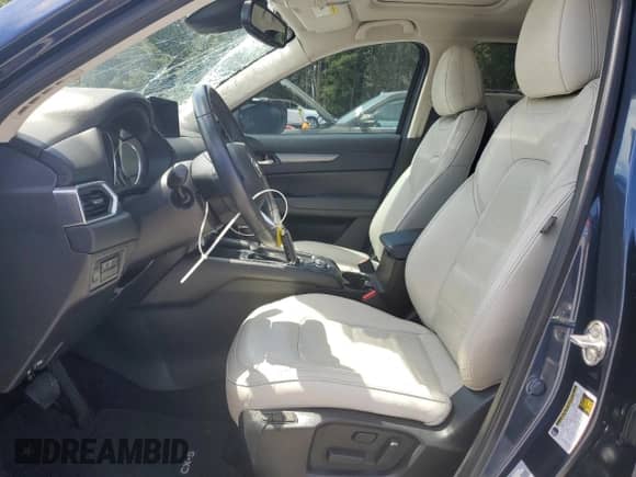 2022 Mazda CX-5 S Carbon Edition with VIN JM3KFBCMXN1553233, listed as a Copart auction lot 69819915 with 25,990 mi miles and Salvage title. Bid and sale history available at DreamBid. Image 7.