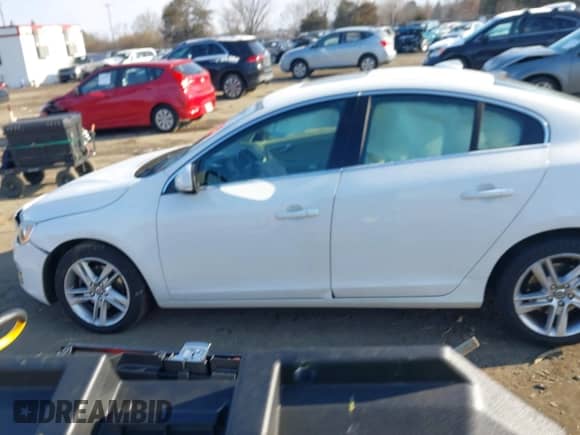 2015 Volvo S60 T5 Drive-E Premier with VIN YV140MFB1F2305578, listed as a IAAI auction lot 41417997 with 114,546 mi miles and . Bid and sale history available at DreamBid. Image 13.