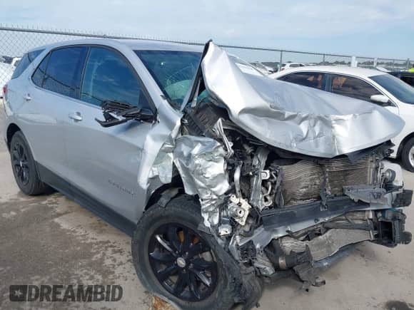 2020 Chevrolet Equinox LT with VIN 2GNAXTEV4L6134230, listed as a IAAI auction lot 43399800 with 122,008 mi miles and . Bid and sale history available at DreamBid. Image 1.